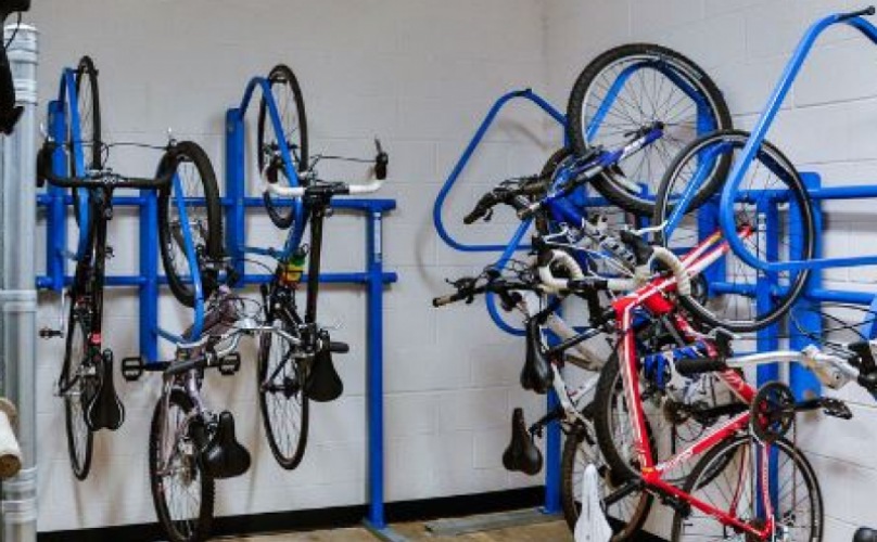 Bikes stored in the interior bike storage room in The Linden Apartments